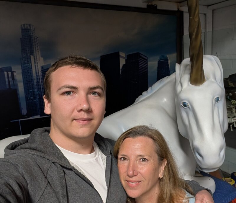 Josh and Tanya with a unicorn prop